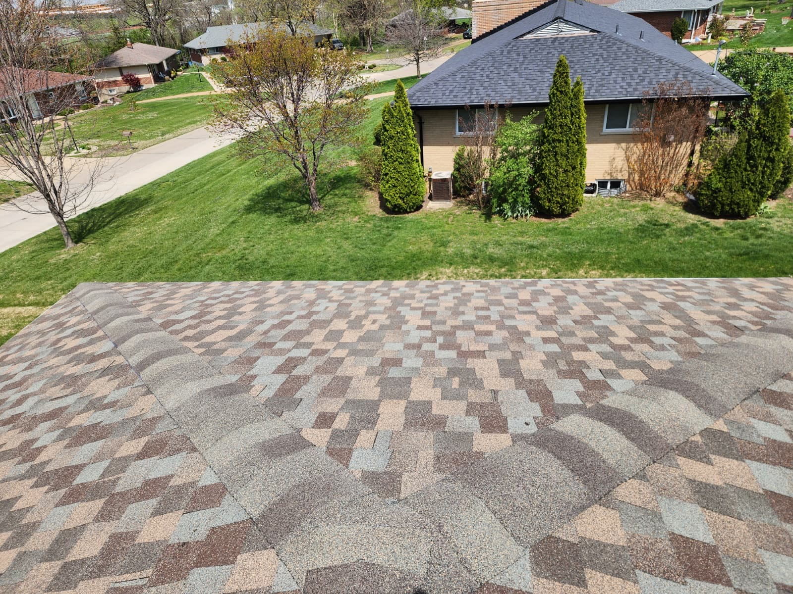 Aerial view of newly installed architectural shingle roof